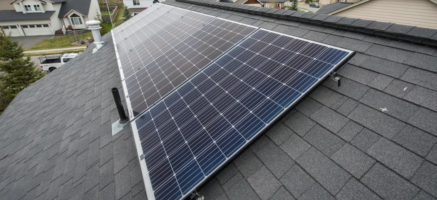 Rooftop solar array along a roof ridge on a Florida home