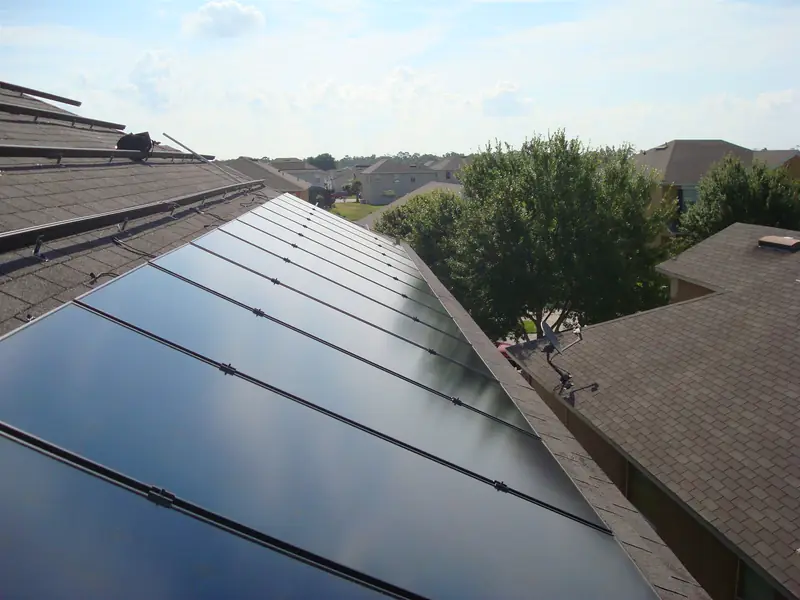 Solar array partially removed from a Florida roof during a reroof
